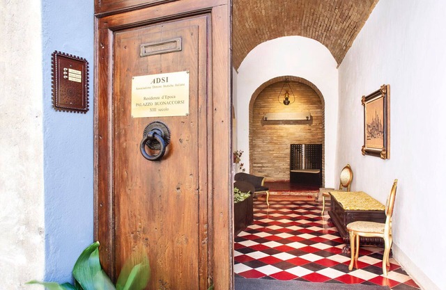 San Gimignano in the heart of town, Historical Palace Buonaccorsi XIII century