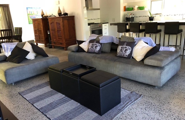 "Sandcastles" is a stunning modern-style beachfront property in New Brighton.