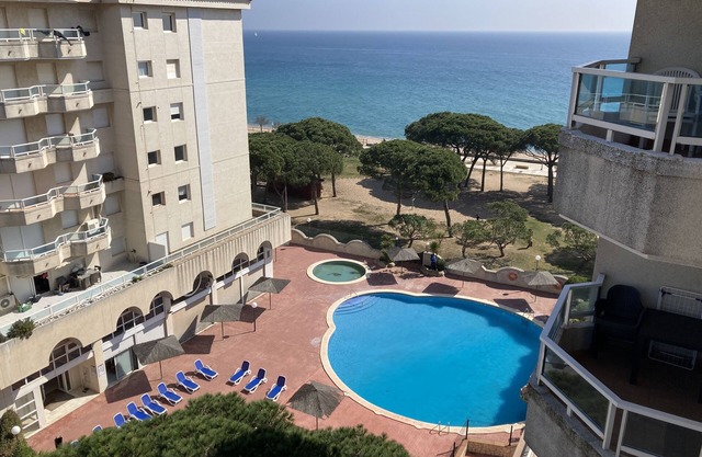 Seafront apartment with balcony