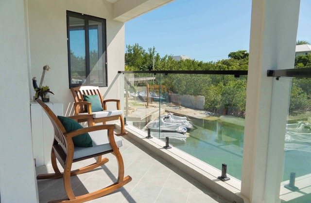 Serene Canalfront Stay | Private Balcony | Hammock