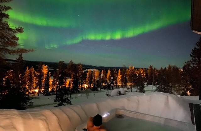 Ski-in Log Villa with Stunning Jacuzzi Views at Syöte