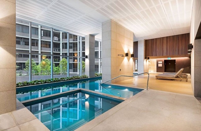 Sky-High CBD Retreat | 2BR Apartment w/Pool & Gym