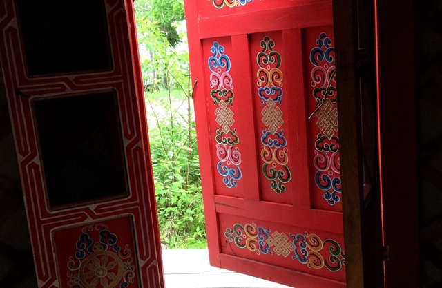 Small red yurt at Cabot Shores Wilderness Resort