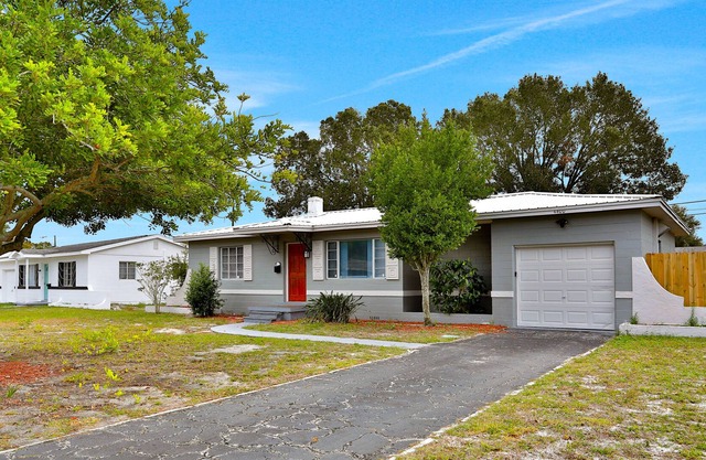 Snowbird-friendly home with fenced yard, work-from-home space, & washer/dryer