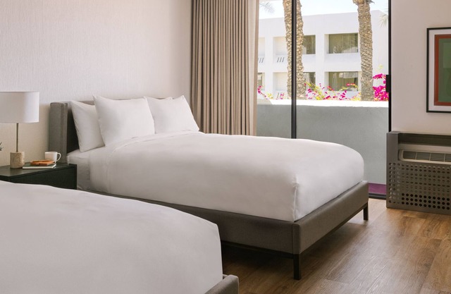 Sonder The Monarch | Double Queen Room w/ Pool View