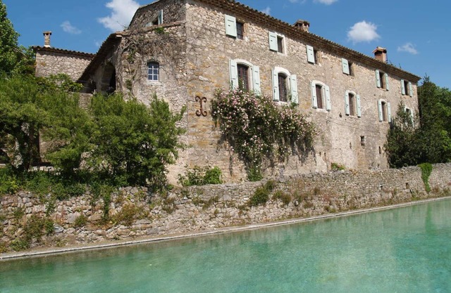 South of France (Cévennes),a 16th Century hamlet surrounded by rolling countryside, property of 32ha crossed by a river, swimming pool, tennis