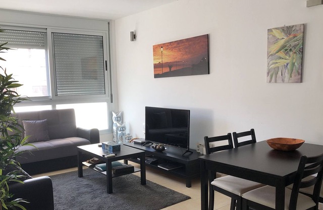 Spacious, modern 3 bedroom penthouse in town with AC and WIFI!