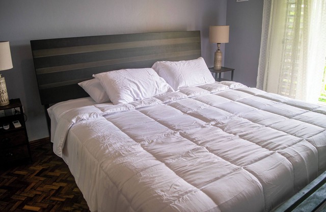 Spacious 2/3/4 bedroom townhome overlooking Kingston 8 with A/C and WiFi