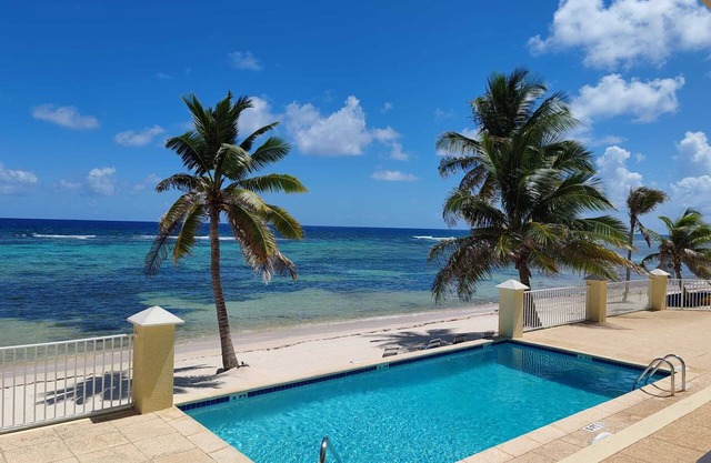 Spacious 2-bedroom ocean view condo in enchanting Bodden Town, including a car!