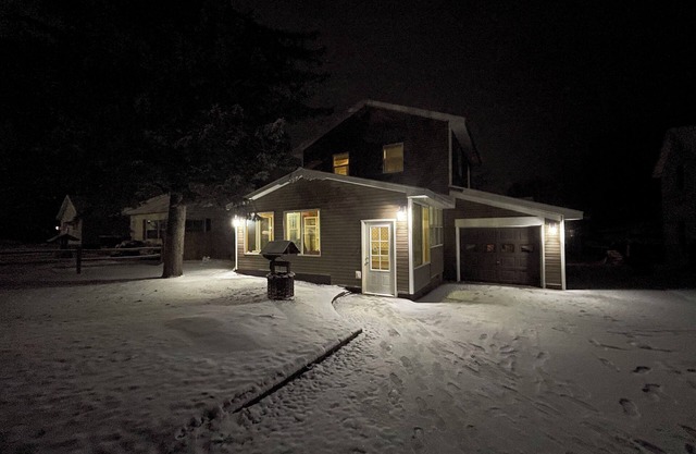 Spacious 4-bedroom home with atv/snowmobile trail across the street. Come UP!