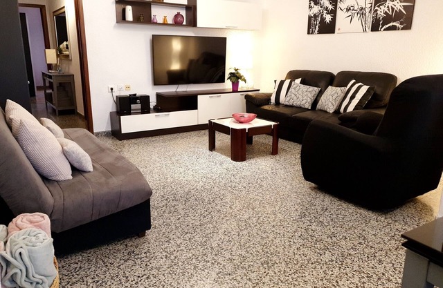 Spacious and central apartment with terrace, very comfortable, for families.