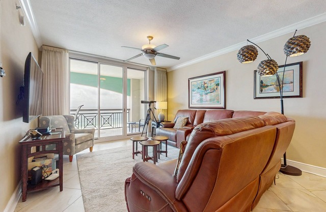 Spacious beachfront condo with full kitchen, shared pool and beach access