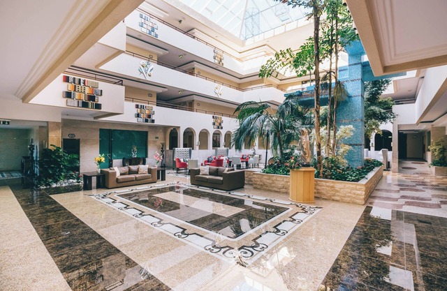 Spacious Family Apt w/Balcony, Kitchenette & Pool – 5-min Walk to Beach