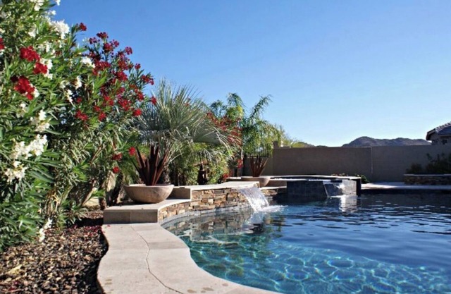 Spacious home w/heated pool, spa. Close to sport complexes