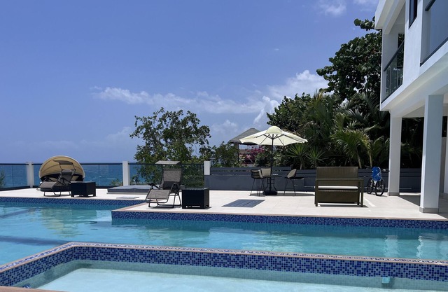 Spacious, modern, luxury group getaway overlooking Caribbean Sea
