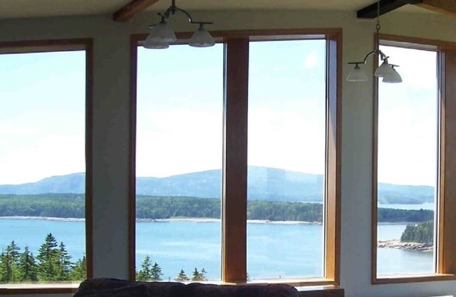 Spacious, modern, & private, with grand views from a hill-top location.