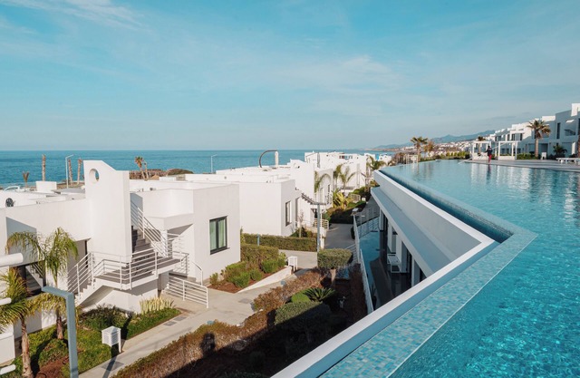 Spectacular Modern Apartment with Front-line Sea Views and Roof Terrace
