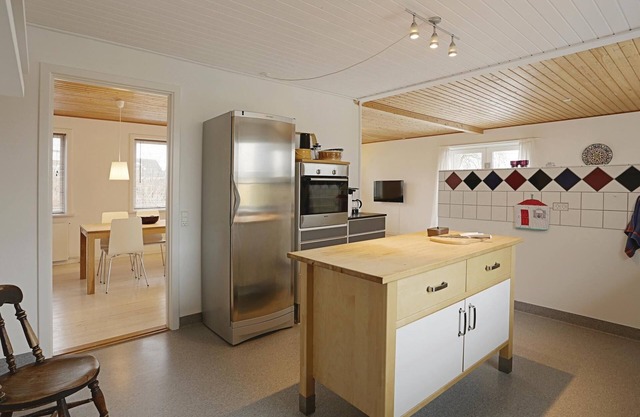 Stay centrally in Østermarie, in this spacious and brightly furnished holiday home on two levels.