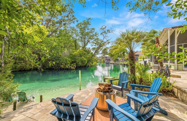 Stay directly on crystal clear waters of Weeki Wachee River with your own beach!