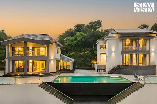 StayVista at Isolaire with Bonfire, Infinity Pool