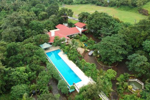 StayVista's Casa Palmera - Pet-Friendly Villa with Pool, Garden with Gazebo, and Indoor & Outdoor Games