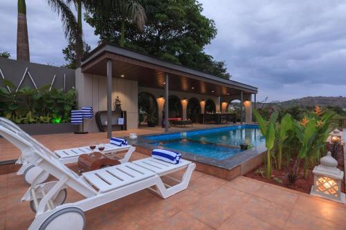 StayVista's The Cincin with Elegant Rooms, Snooker Table, Pool, Scenic View