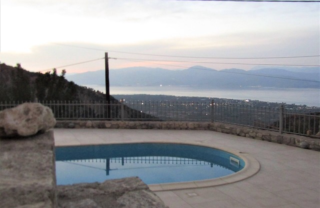 Stone house with pool and view to the sea