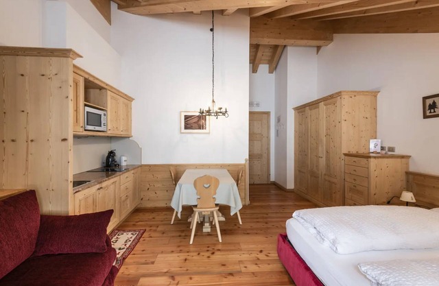 Studio Apartment 'Appartamento Mono 3 - Marmolada' with Mountain View, Shared Garden and Wi-Fi