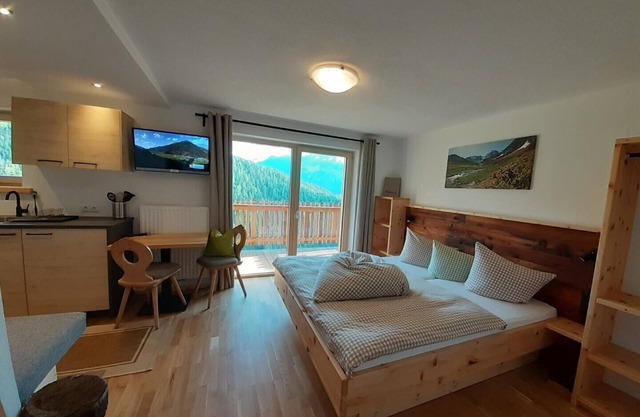 Studio in Ötztal with wellness, children's playground and farm
