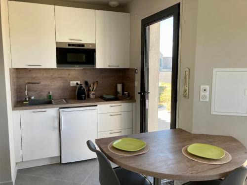 Studio neuf avec terrasse