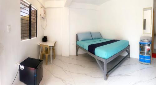 Studio room with AC and kitchenette in the center