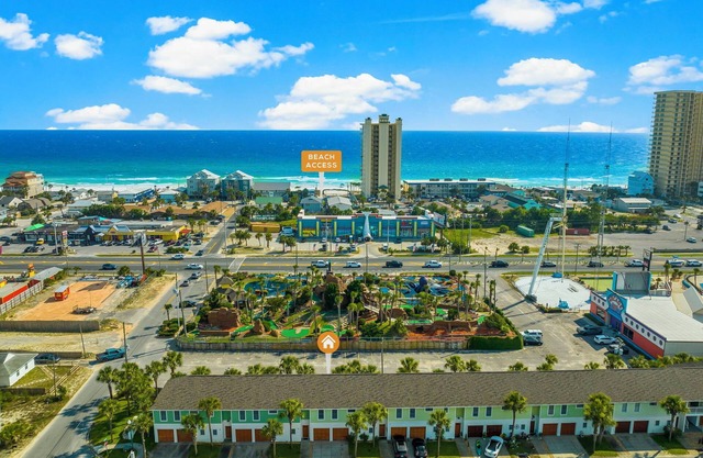 Stunning Beachside Townhouse with Pool, 2 Car Garage, and Lagoon Access