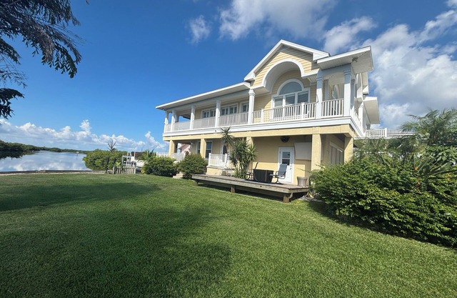 Stunning Key West Style Waterfront Home with Exceptional Views!nAdditional RV.