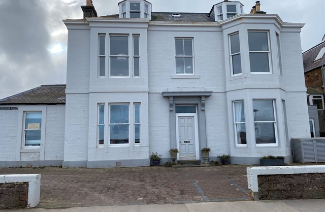 Stunning location - beachfront ground floor flat with private parking. Fab views