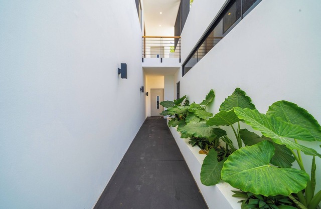 Stunning new 4-bedroom ocean view modern beach home overlooking Flamingo Marina.