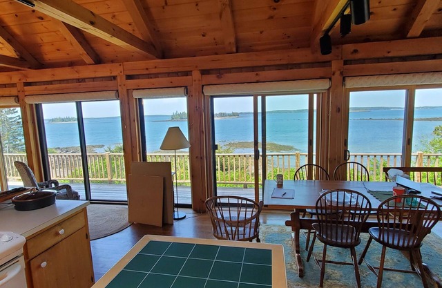Stunning sunset views from this adorable oceanfront cottage