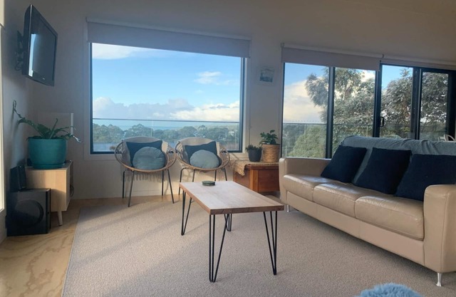 Stunning water views; relaxed coastal atmosphere; multiple entertaining areas