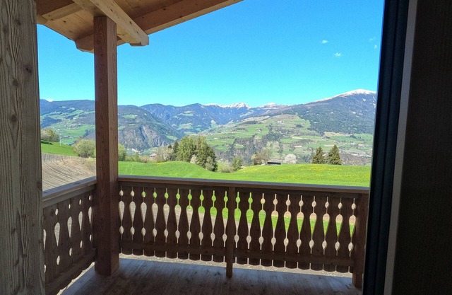 stylish chalet surrounded by meadows with a fantastic view