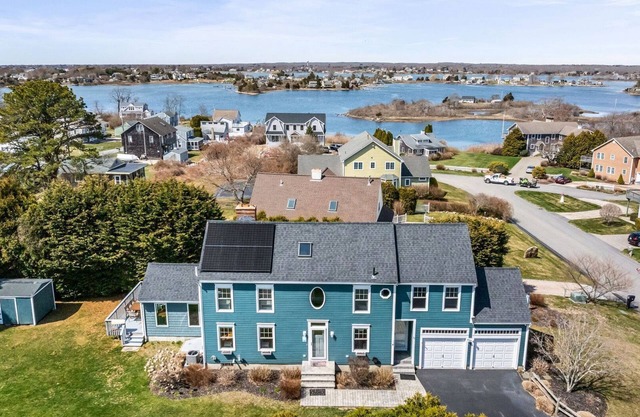 Stylish coastal retreat w/water views, cozy outdoor firepit &shower, alfresco dining&more!