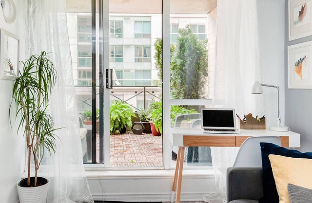 Stylish downtown apartment with private patio and parking