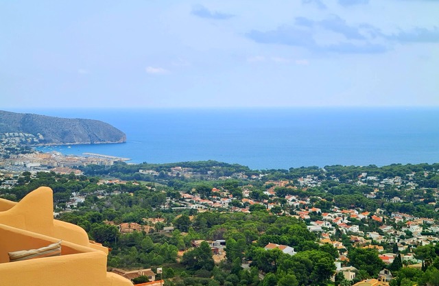 Stylish Duplex in Moraira with Stunning Sea Views and Communal Pool.