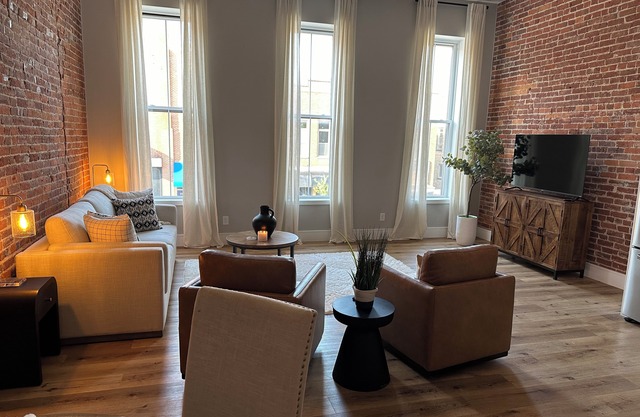 Stylish & Modern 2-Bdrm Apt in Downtown Warsaw featuring an urban rooftop deck.