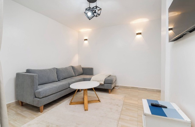Stylish, Modern Apartment with Workspace Near Top Amenities & 24/7 Security