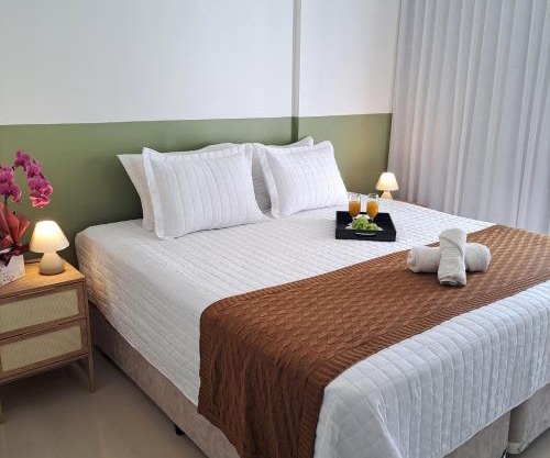 Suíte com varanda e piscina na Barra da Tijuca - RJ