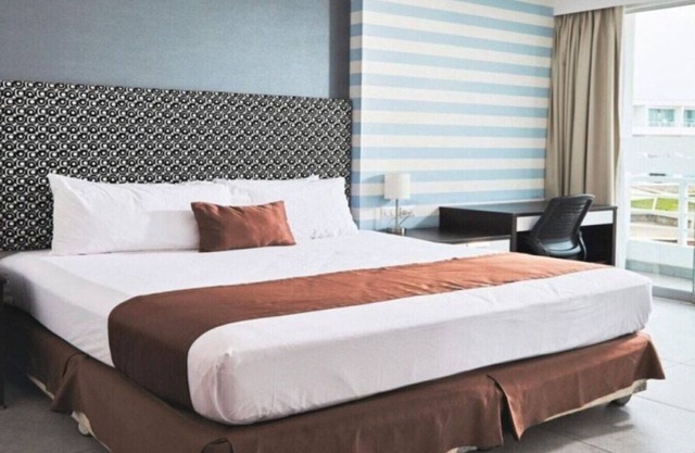 Suite Matrimonial King and living Room at VPX Hotel