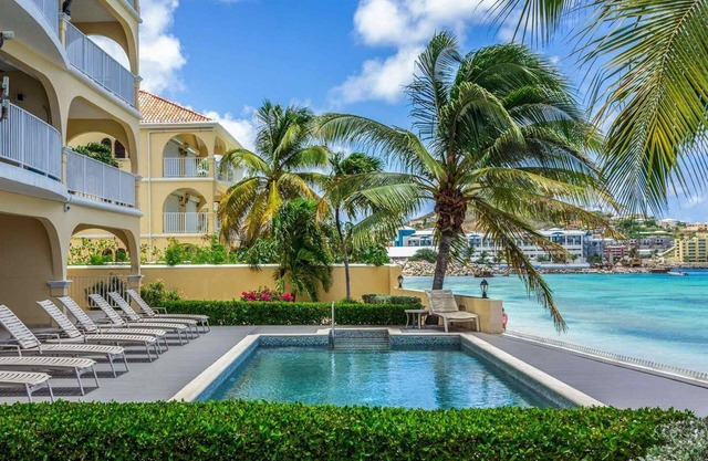 Sun-kissed Beachfront Condo with Pool & Gorgeous Sunsets at Encanto- La Siesta