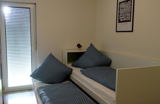 Sunny apartment with large garden in a local recreation area