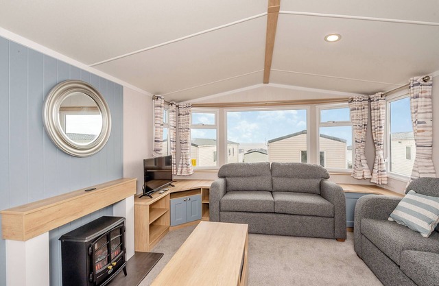 Super 12ft-wide luxurious caravan with one double and two twin.