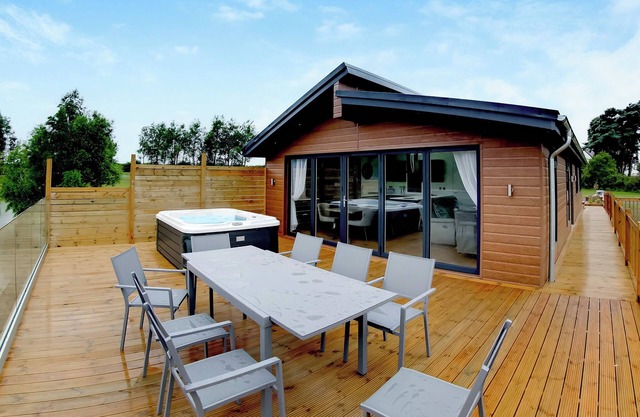 Superb bespoke lodge with four bedrooms sleeping up to ten people.