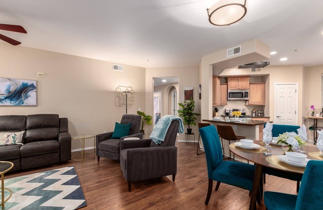 Surprise Ground Floor Condo with 2 Private Courtyards! Heated Community Pool!